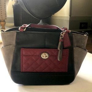NWOT Coach purse, in black, gray and burgandy